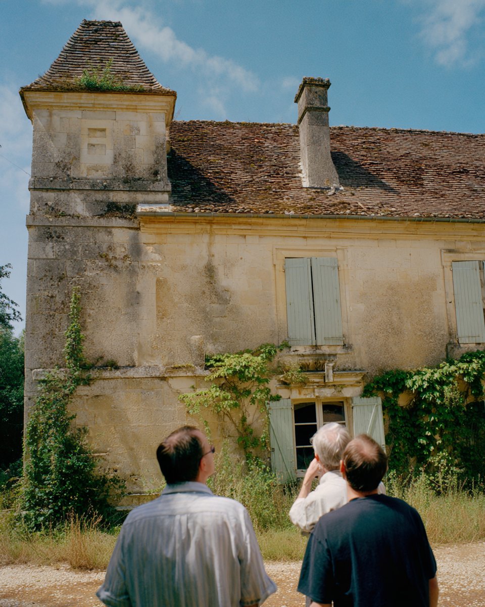 Surveying a stone manor house during the audit visit