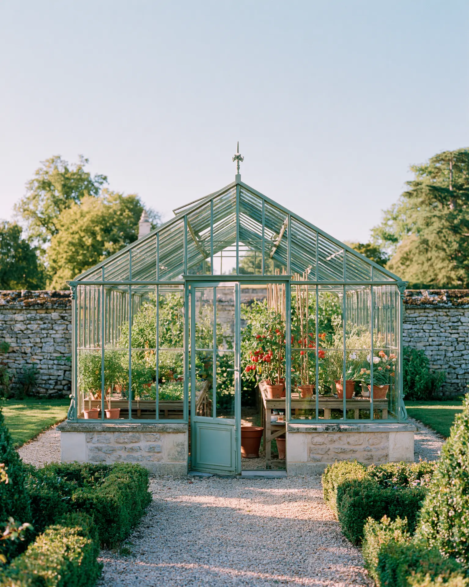 Cast-iron greenhouse in the kitchen garden