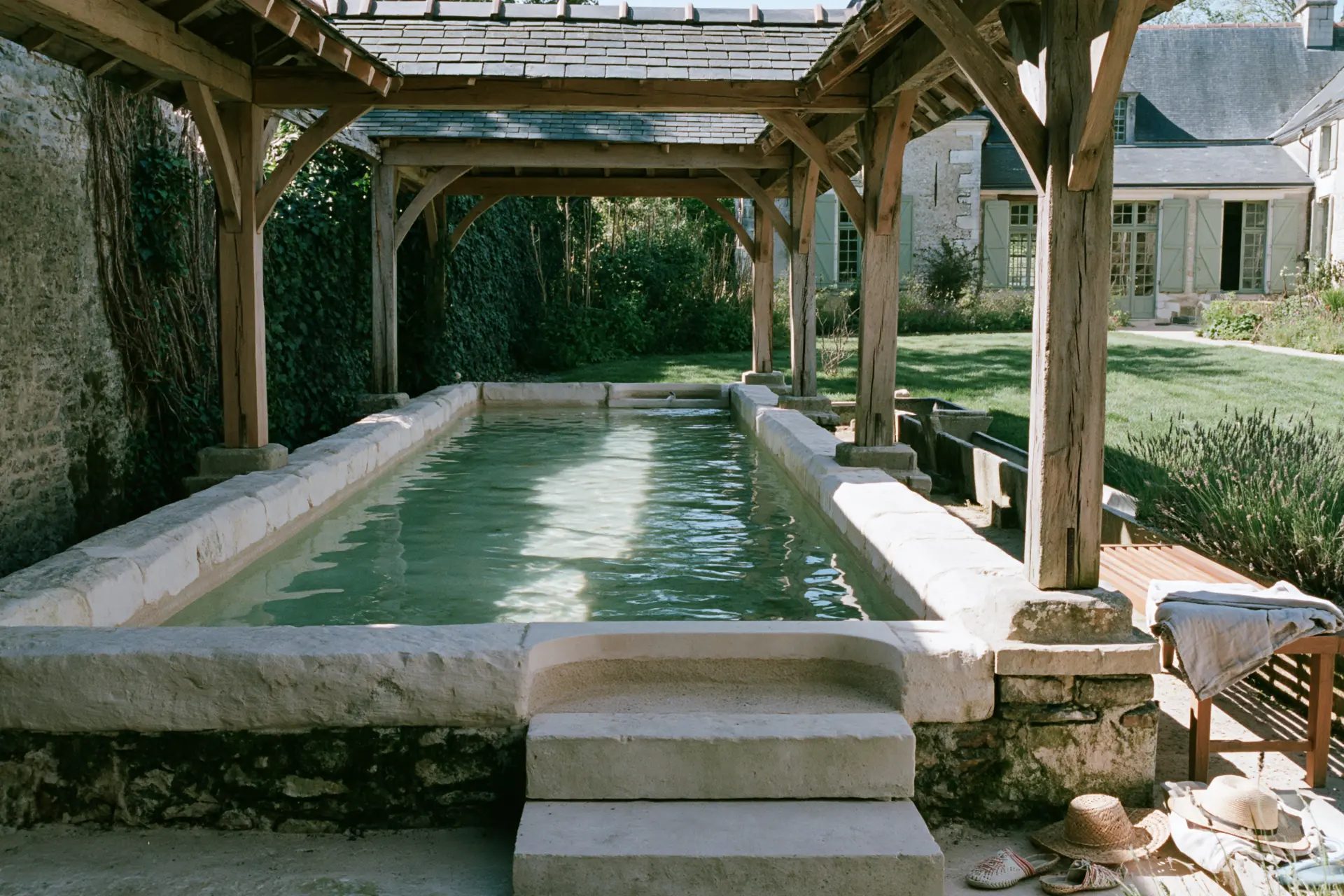 Natural pool edged in stone on a country estate